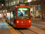 Seattle streetcar - at night at Westlake Hub